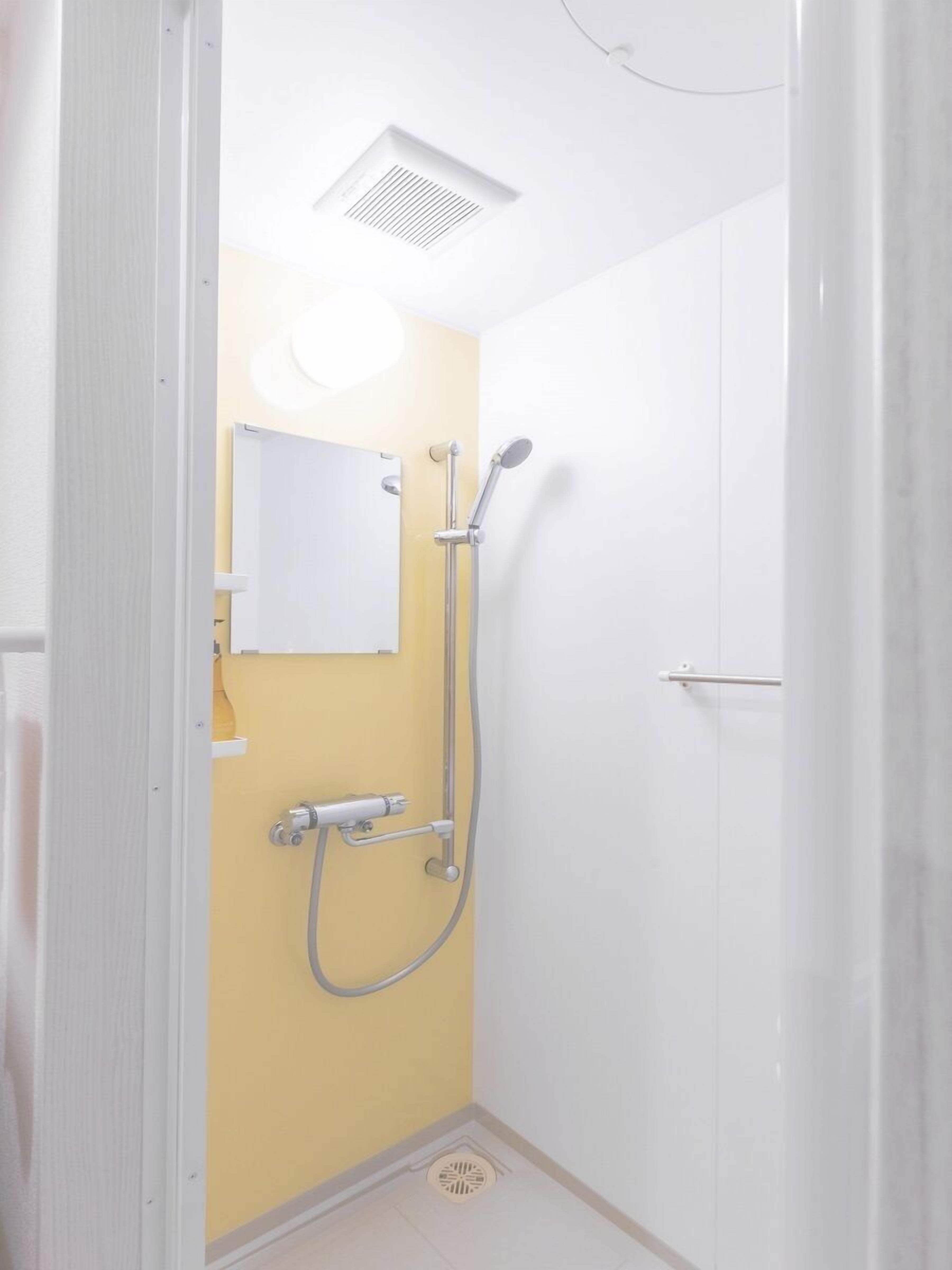 shower, free toiletries, hair dryer, slippers