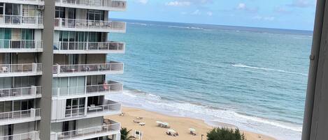 On the beach, sun-loungers, beach towels