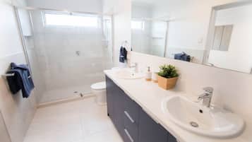 Bathtub, hair dryer, towels