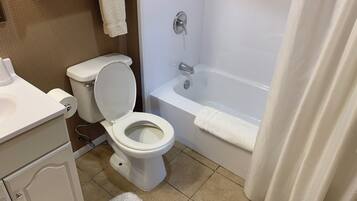 Bathtub, hair dryer, towels