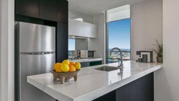 Executive Apartment, 2 Bedrooms | Private kitchen | Full-sized fridge, microwave, oven, stovetop