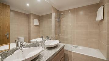 Bathtub, hair dryer, towels