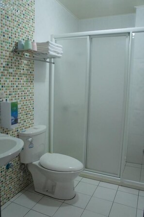 Quadruple Room | Bathroom | Shower, hair dryer, slippers, towels