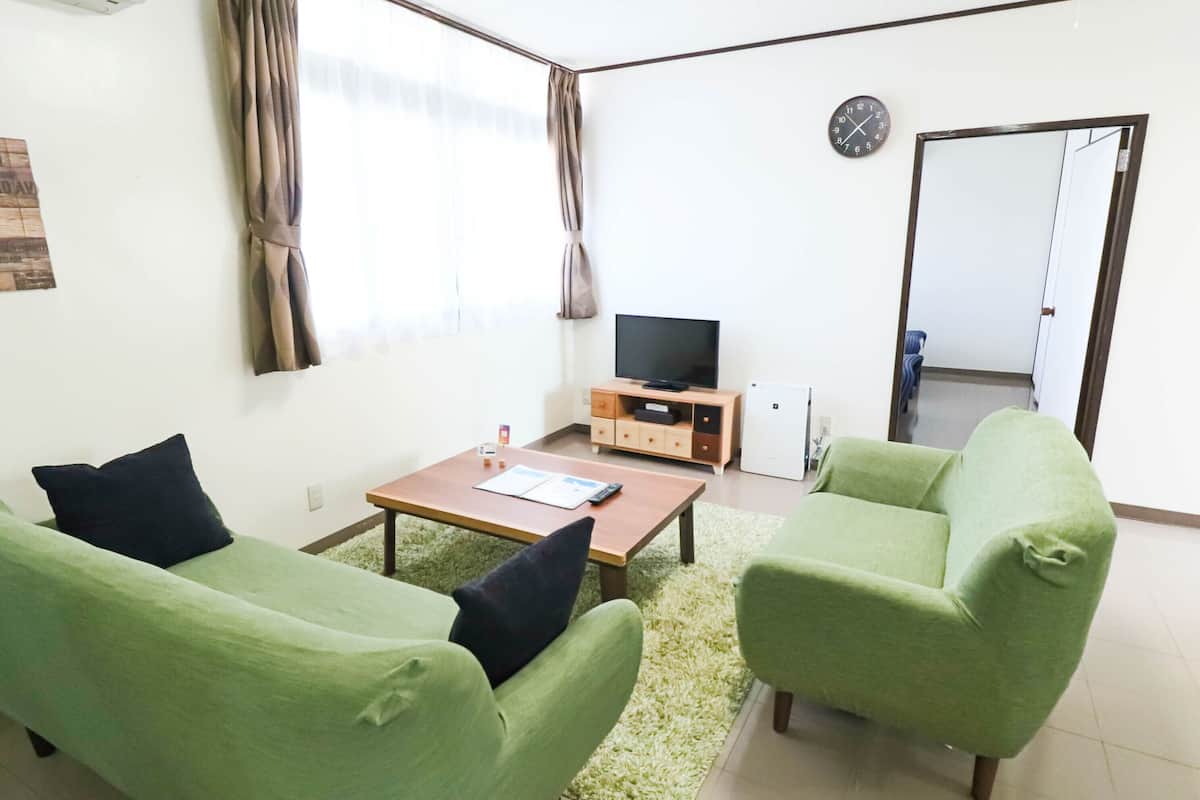 Apartment, 2 Bedrooms (B) | Living area | LCD TV, toys
