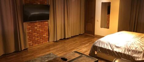 Habitación de lujo | Caja fuerte, sistema de insonorización, tabla de planchar con plancha