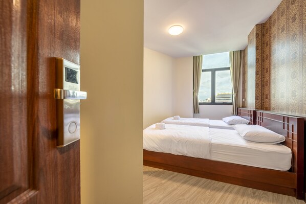 Twin Room, City View | Blackout curtains, free WiFi, bed sheets