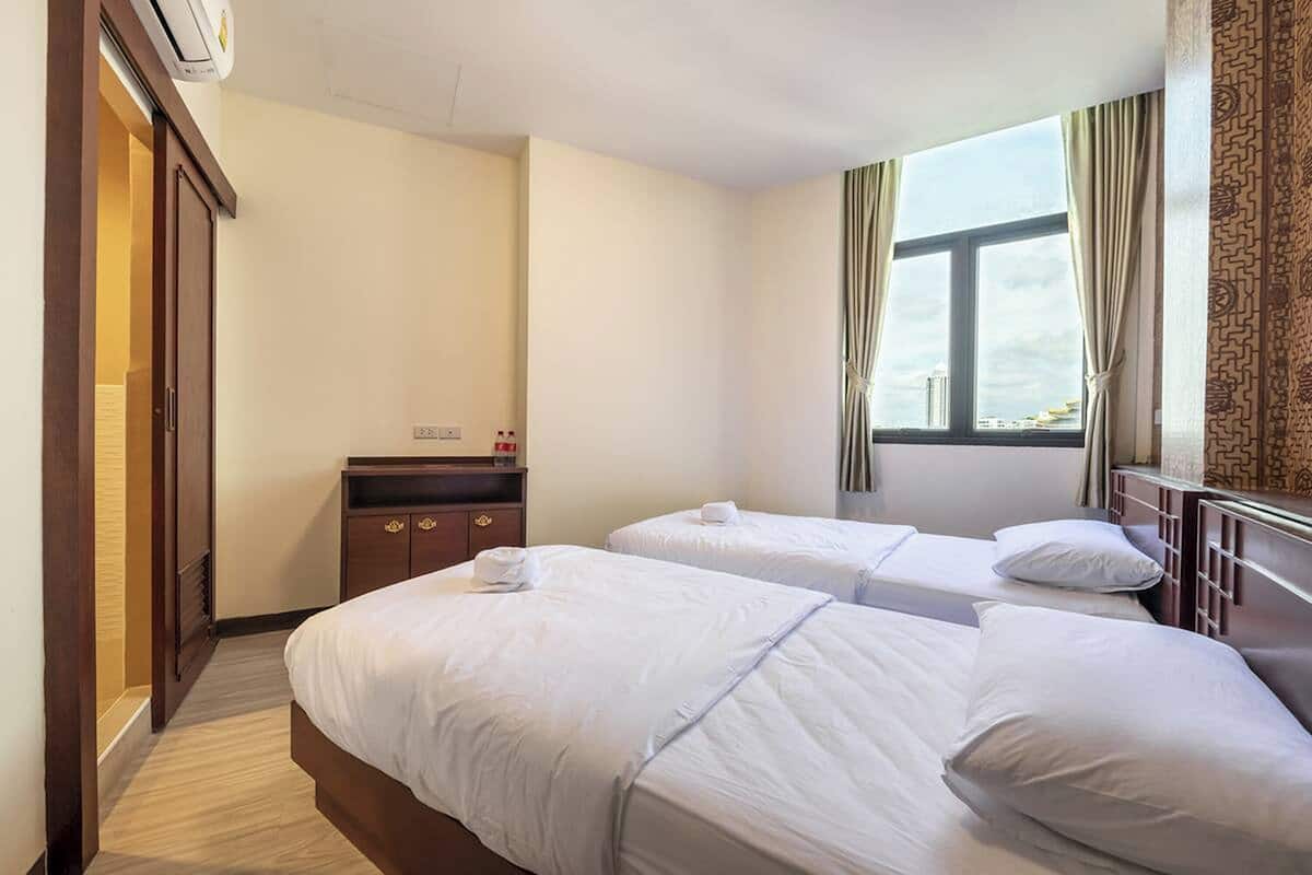 Twin Room, City View | Blackout curtains, free WiFi, bed sheets