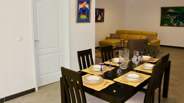 Comfort Apartment, 2 Bedrooms | Living area | 32-inch plasma TV with satellite channels, TV - Guest House De Treichville (Abidjan)
