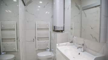 Hair dryer, towels, soap, shampoo