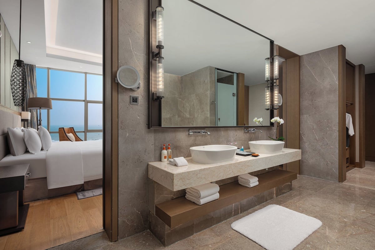 Suite, 2 Bedrooms, Club Lounge Access, Ocean View | Bathroom | Separate tub and shower, rainfall showerhead, free toiletries