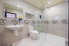 Shower, free toiletries, hair dryer, slippers