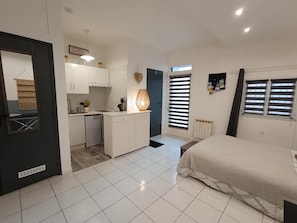 Fer et planche à repasser, draps fournis