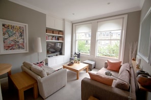 Apartment (2 Bedrooms) | Living room | 20-inch TV with digital channels