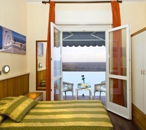 Double or Twin Room, Balcony, Sea View | In-room safe, cribs/infant beds, bed sheets
