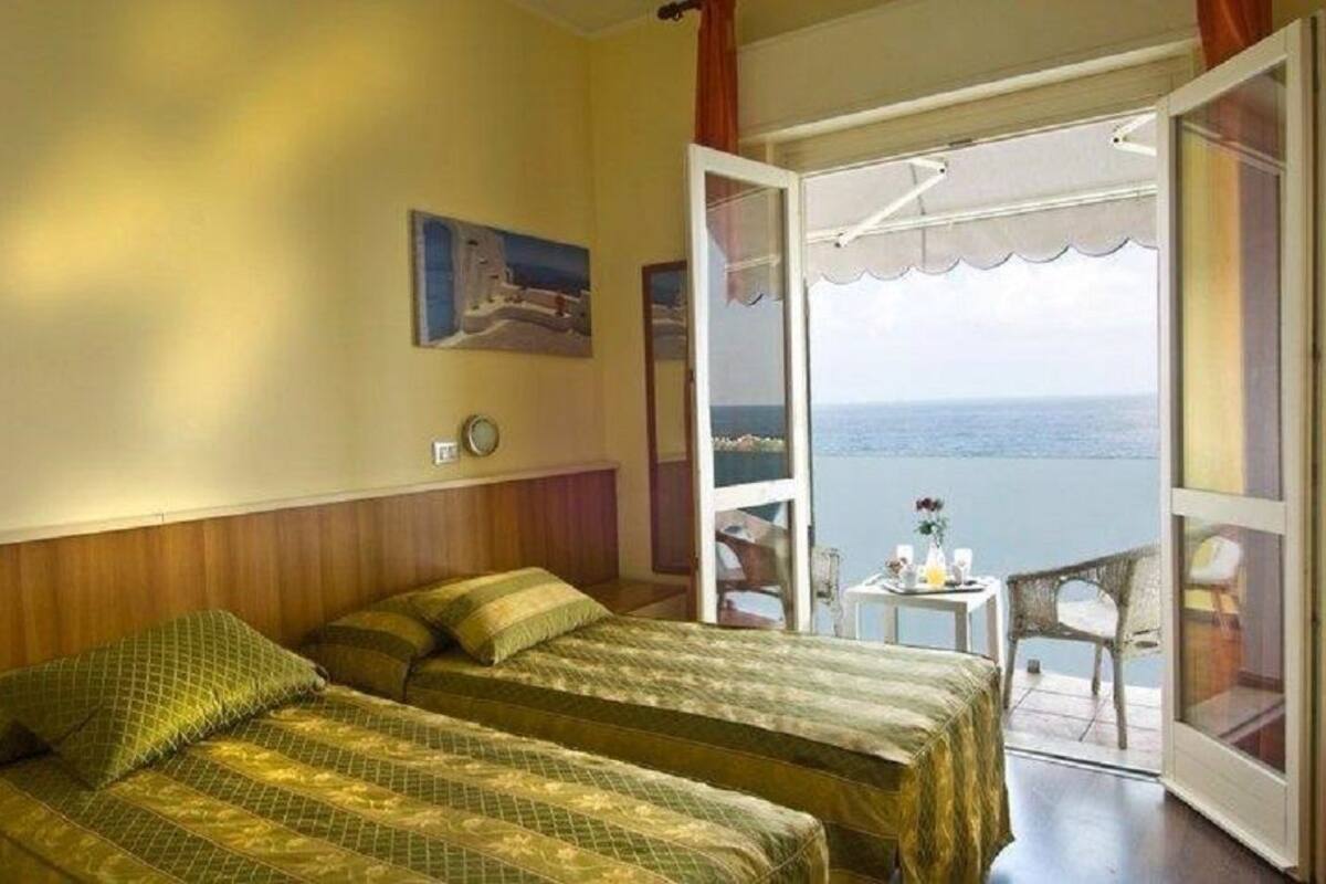 Double or Twin Room, Balcony, Sea View | In-room safe, cribs/infant beds, bed sheets