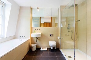 Bathtub, hair dryer, towels