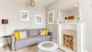 Deluxe appartement, meerdere bedden | Woonruimte