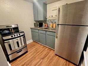 Fridge, microwave, oven, stovetop - Boho Studio in the Heart of OKC (Oklahoma City)