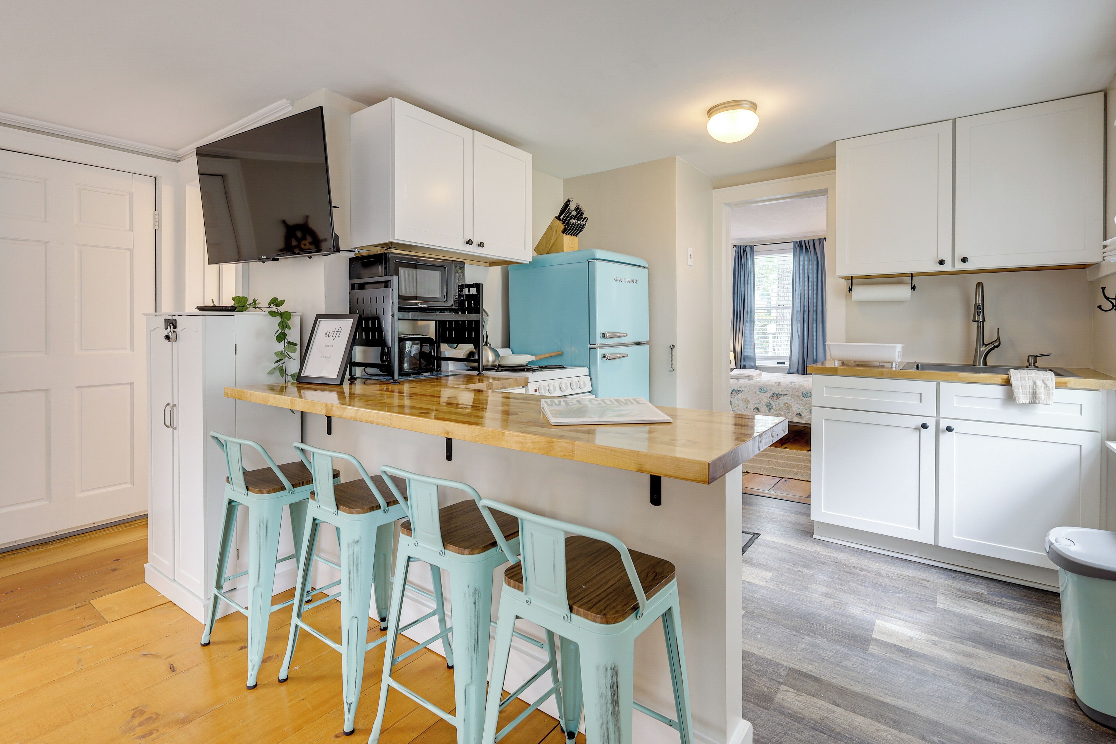 Fridge, microwave, stovetop, coffee/tea maker
