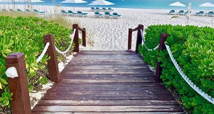 Directly on Beach, Beachy Chic 2 BR - Heart of Grace Bay - Grandview Resort