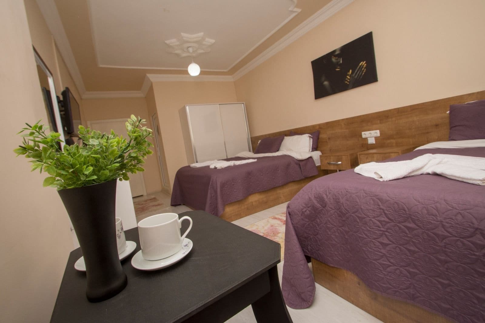 Family Triple Room | Desk, free cribs/infant beds, free WiFi, bed sheets