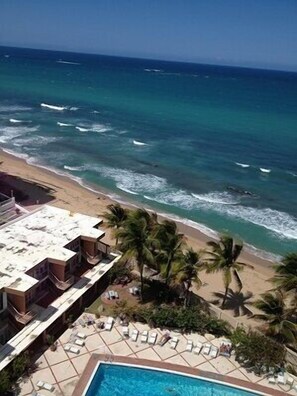 On the beach, sun-loungers, beach towels