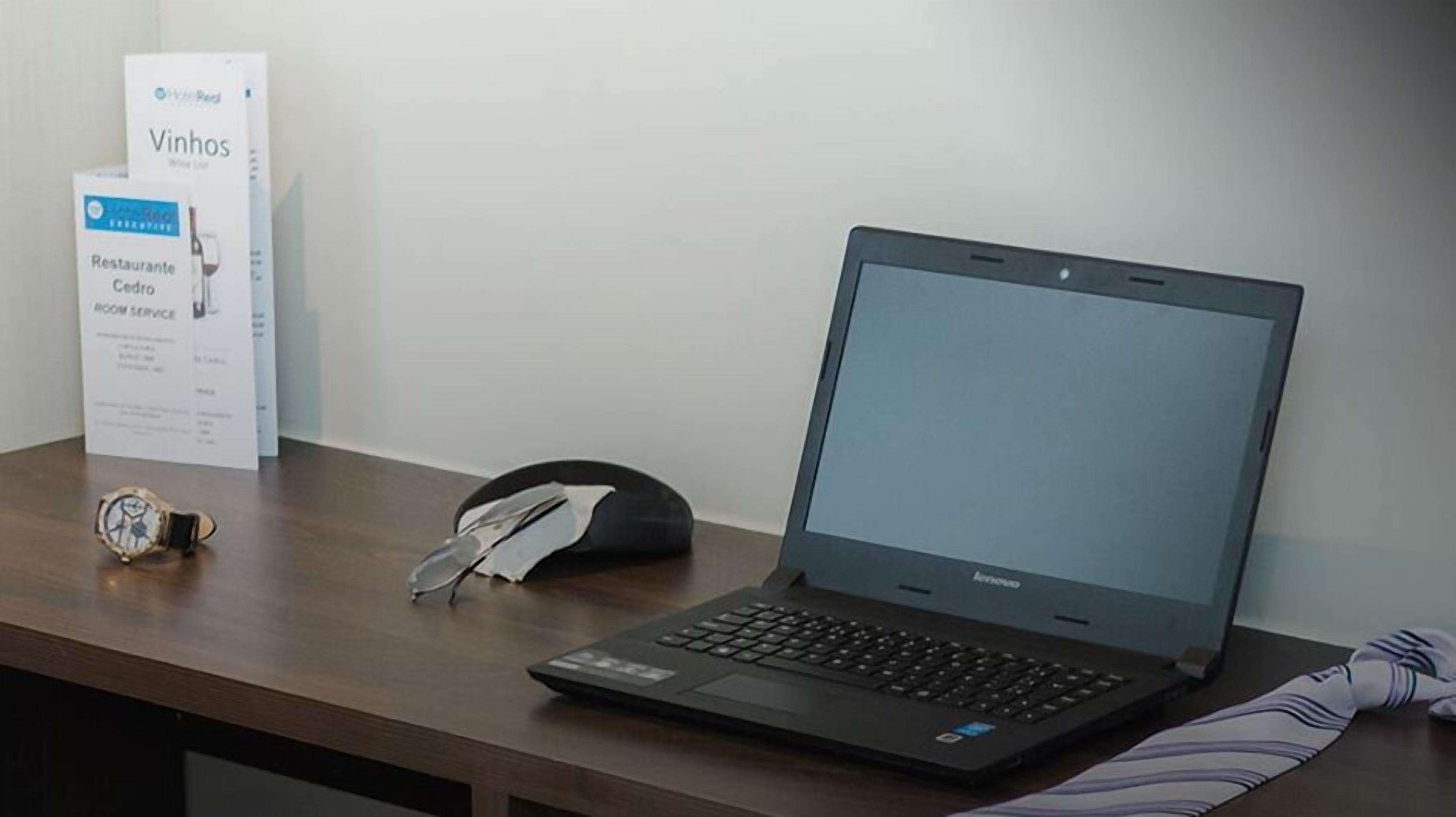 executive double room, 1 bedroom | living area | lcd tv