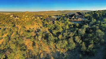 Escape to a secluded, eco-friendly retreat surrounded by lush hills and dense forest.
