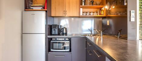 Fridge, microwave, coffee/tea maker, toaster