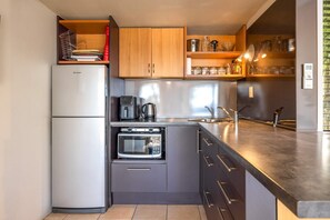 Fridge, microwave, coffee/tea maker, toaster