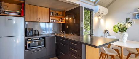 Fridge, microwave, coffee/tea maker, toaster