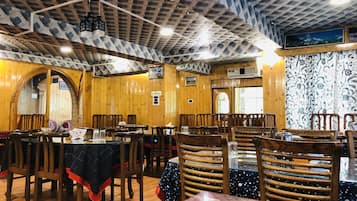 Breakfast, lunch, dinner served; local cuisine