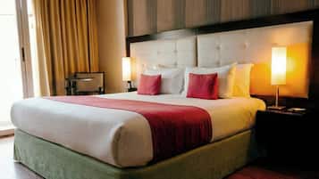 Premium bedding, down duvets, pillow-top beds, in-room safe