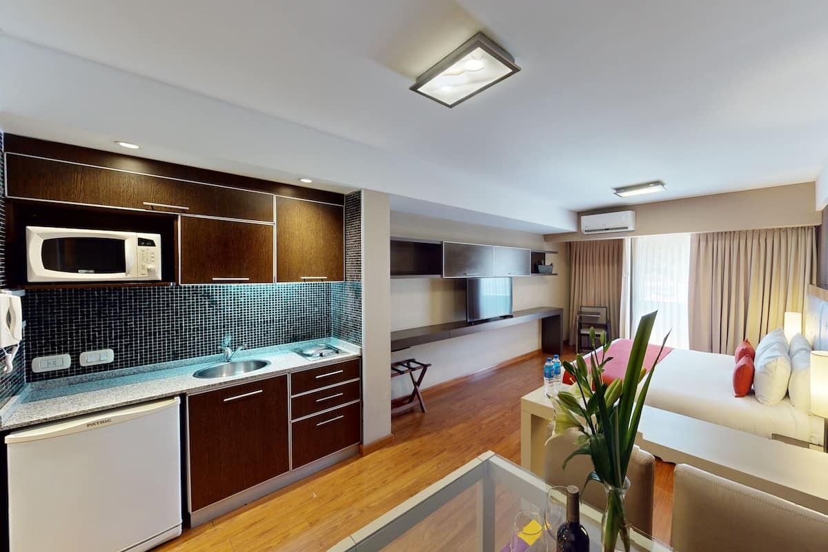 suite | living area | 32-inch lcd tv with cable channels, tv, pay films