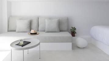 Deluxe Villa, 2 Bedrooms, Jetted Tub, Sea View (Drop) | Living area | 42-inch Smart TV with satellite channels, TV, MP3 dock