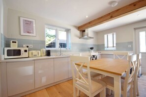 Cottage (Grenadier) | Private kitchen | Full-sized fridge, microwave, oven, stovetop - The Cottages at Crouchers Orchards (Chichester)