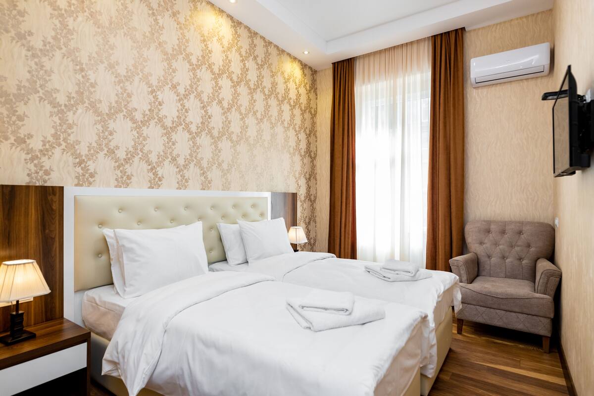 Superior Double or Twin Room | Minibar, desk, laptop workspace, blackout drapes