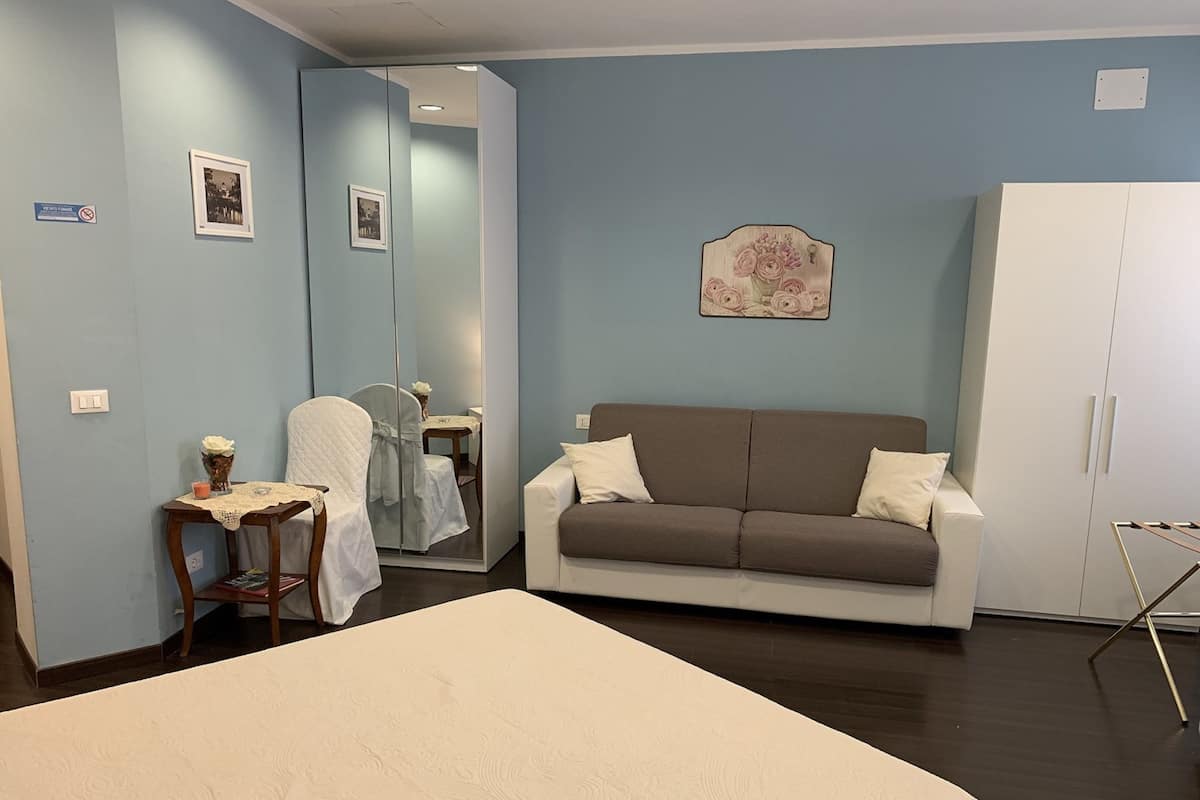 Quadruple Room | In-room safe, free WiFi, bed sheets