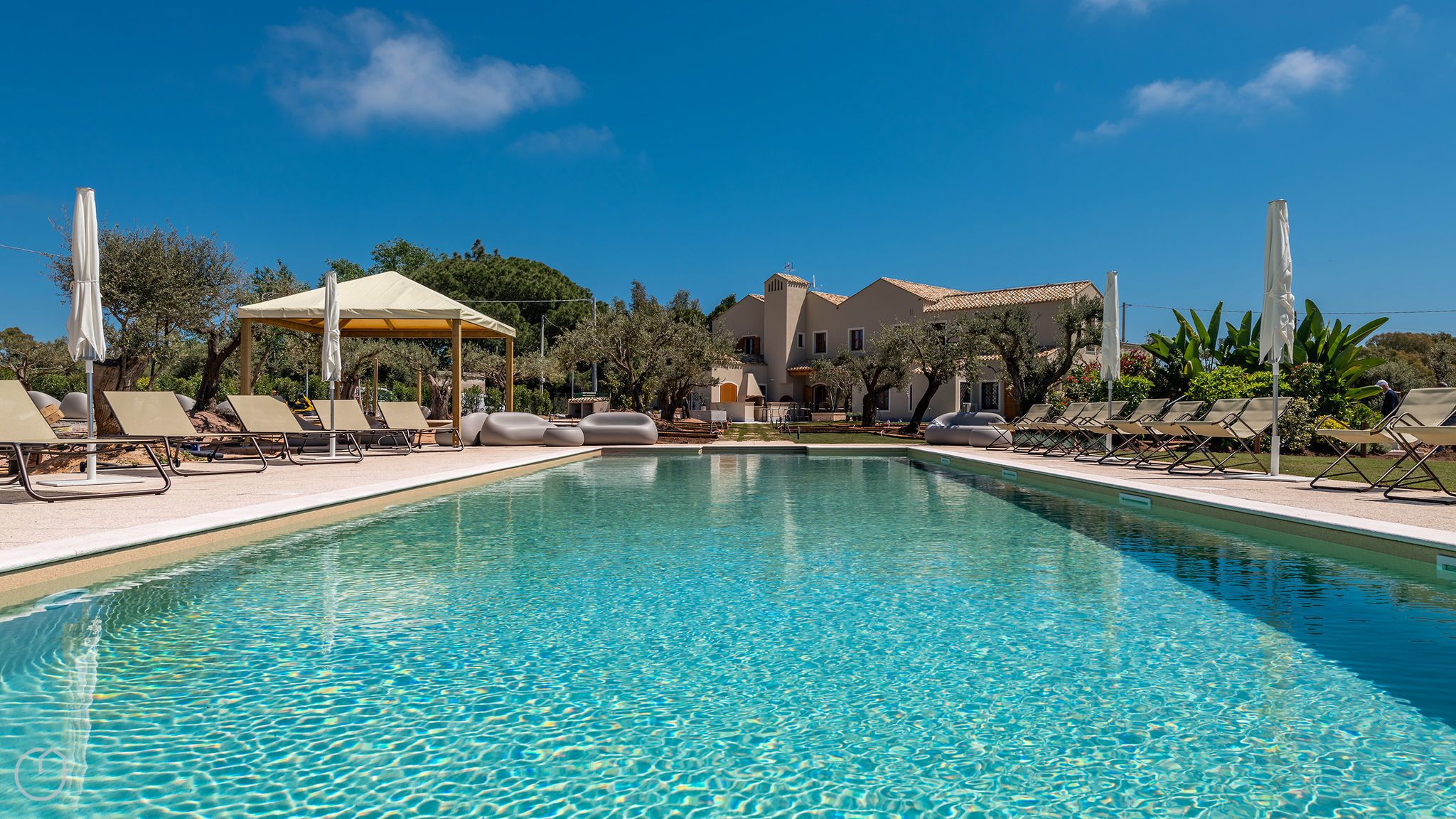 Seasonal outdoor pool, pool umbrellas, pool loungers