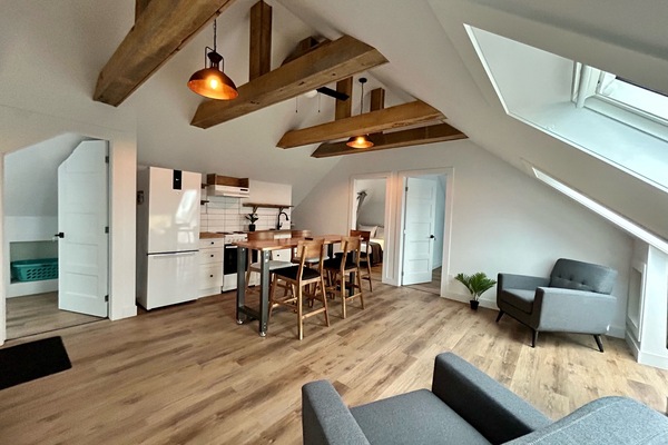 Signature Apartment | Living area | 27-inch flat-screen TV with cable channels, streaming services