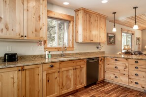Family House | Private kitchen | Electric kettle, toaster, high chair, cookware/dishes/utensils - Shepherd Family Retreats- FOX (West Yellowstone)