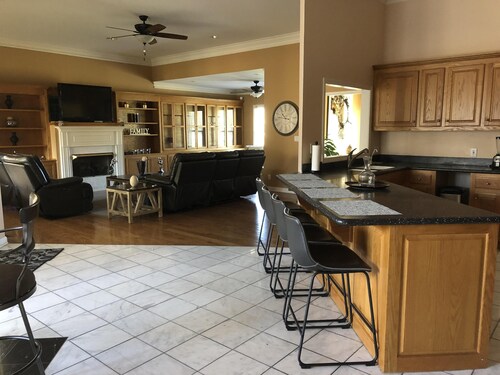 Family style one level home with a modern flair on a one acre lot.