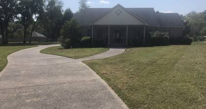 Family style one level home with a modern flair on a one acre lot.