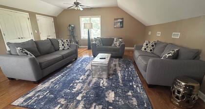 Family style one level home with a modern flair on a one acre lot.