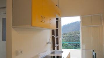 Design Apartment, 2 Bedrooms, Mountain View (Shuruk) | Private kitchen | Fridge, microwave, stovetop, coffee/tea maker
