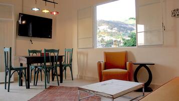 Design Apartment, 2 Bedrooms, Mountain View (Shuruk) | Living area | Flat-screen TV