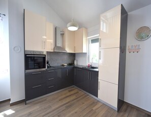 Apartment (Maisonette B6) | Private kitchen | Full-sized fridge, oven, stovetop, coffee/tea maker - Apartments Medna (Dobrinj)