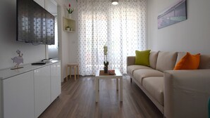 Apartment, 2 Bedrooms (B2) | Living area | Flat-screen TV - Apartments Medna (Dobrinj)