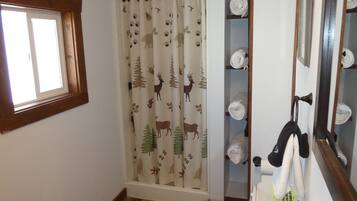 Hair dryer, towels, soap, shampoo