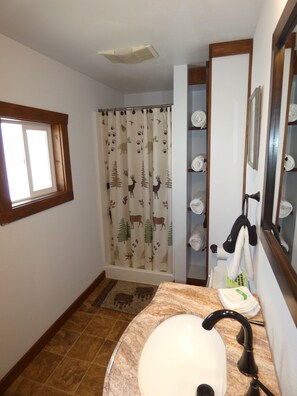 Hair dryer, towels, soap, shampoo